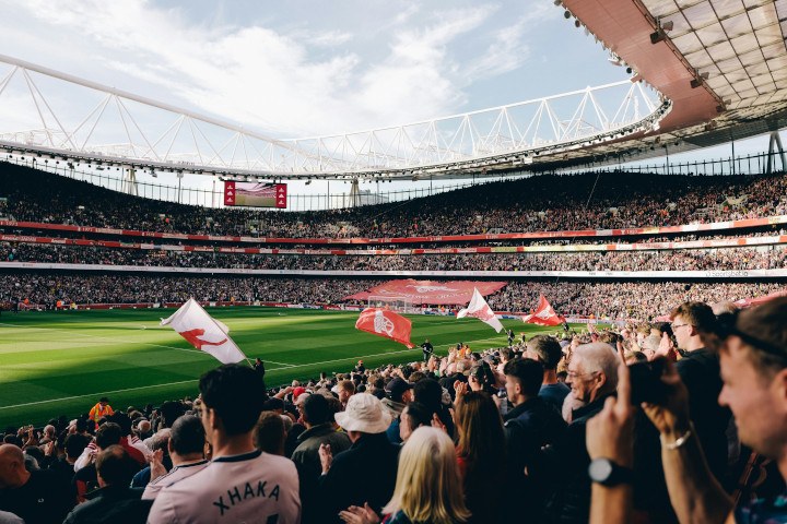 Premier league stadium pictured with fans just before match to start